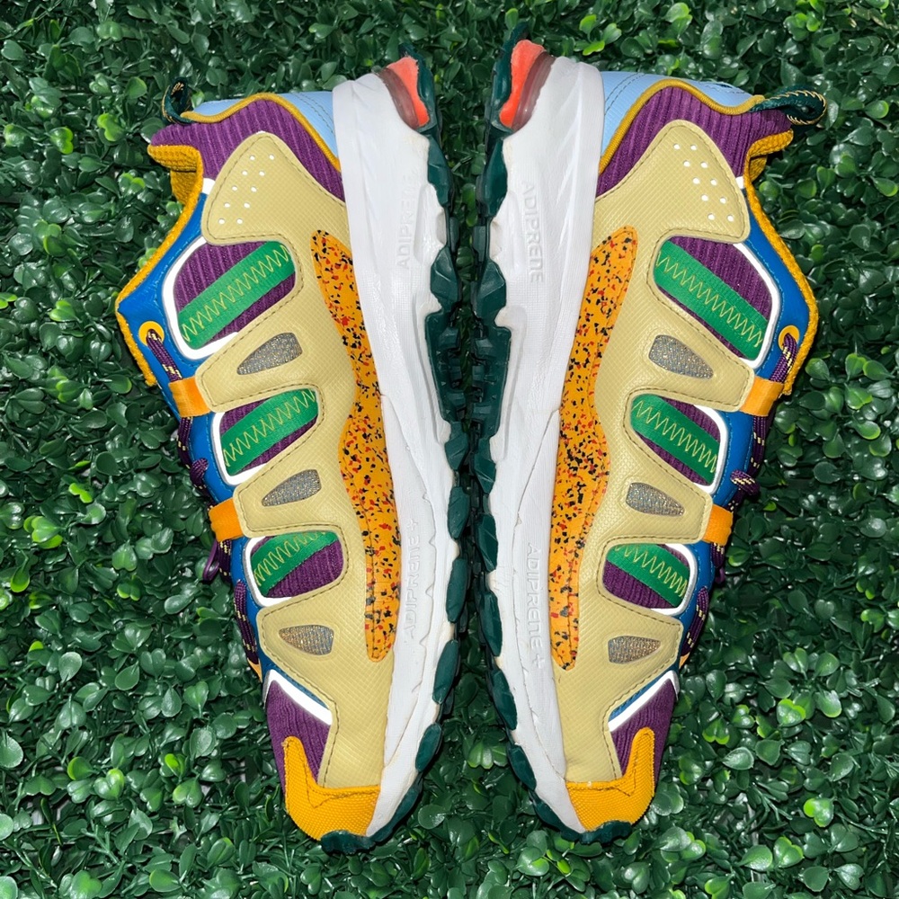 Adidas x Disney Yellow Mesh Athletic Sneaker with Blue and Green Accents